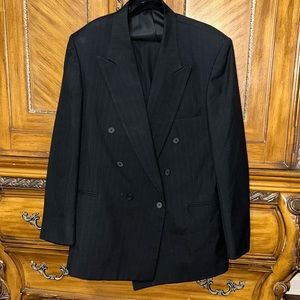 Gently worn black pinstripe suit.
